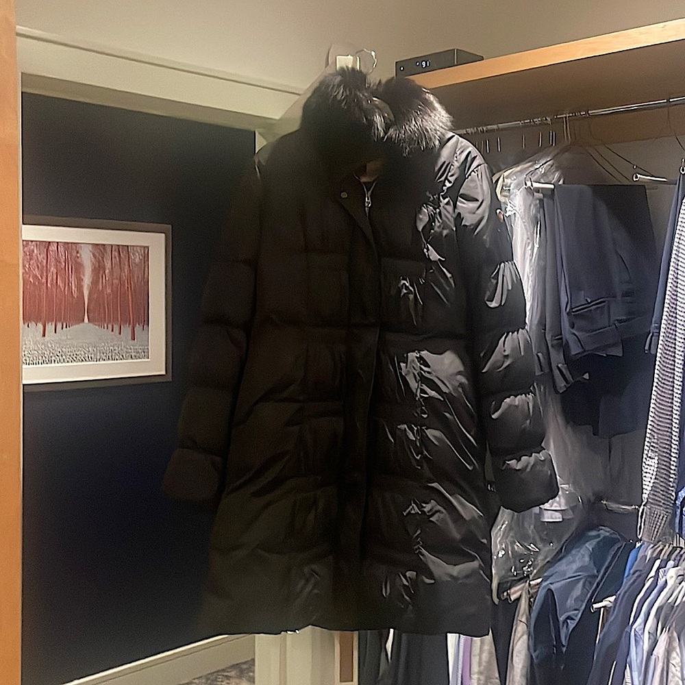 Down winter coat with black fur color from luxury Italian brand Postcard.